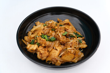 Kwetiaw or Kwetiau, fried rice noodles with meatballs and vegetables. Popular in Indonesia
