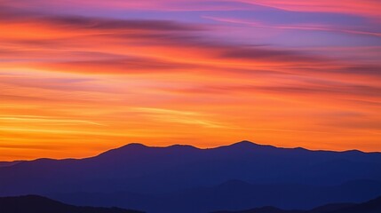 Obraz premium Sunset sky over the Mountains