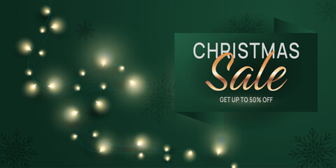 Christmas sale discount banner template with Christmas lights, string lights on luxurious emerald background. Realistic glowing garlands for promo, special offer, cards, gift voucher, web. Vector