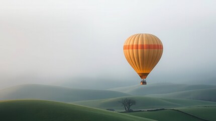 Naklejka premium Scenic Hot Air Balloon Floating Over Rolling Green Hills