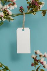 Mockup of a label on a jute string with a minimalist background and floral accents. Perfect for branding and design projects.
