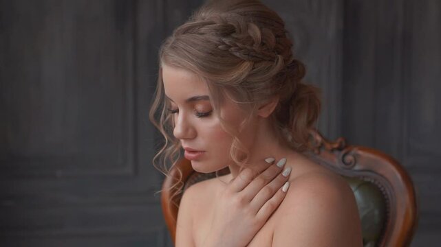 fashion model young blonde woman crying sitting on chair broken heart sadness, dark classic interior room black wall. Adult girl in vintage old style retro lady. fantasy fairy medieval lonely princess