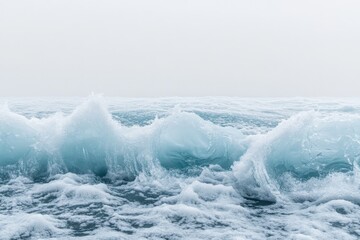 Fototapeta premium A mesmerizing scene showcasing frozen waves in the ocean captured in stunning icy blue hues, evoking feelings of tranquility, power, and the majesty of nature.