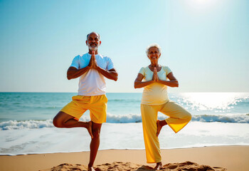 Senior Indian Couple Practicing Yoga Pose at Scenic Beach