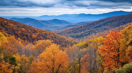 Fototapeta premium Majestic mountain landscape featuring autumn colors and tranquil lake under dramatic skies
