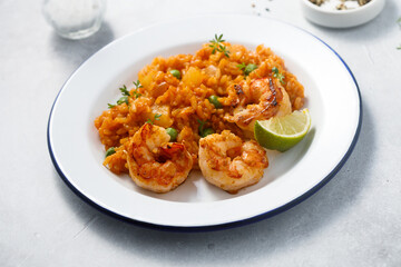 Fototapeta premium Roasted shrimps with spicy rice
