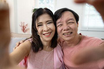 Joyful Senior Couple Celebrating Valentine's Day with Love and Happiness at Home