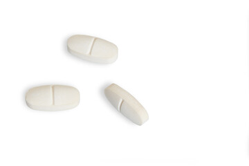 Pharmaceutical pills on white background