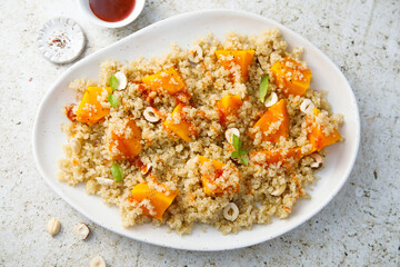 Roasted pumpkin with quinoa and hazelnut