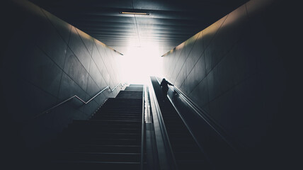 silhouette on escalator