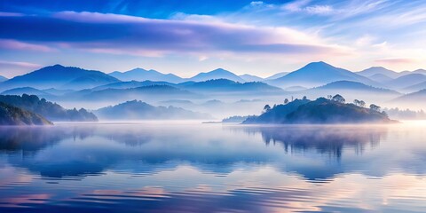 Fototapeta premium Serene Misty Mountain Lake at Dawn with Reflections