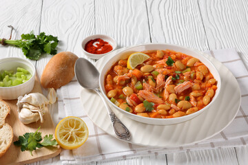 Pasulj, white bean soup with chicken in bowl