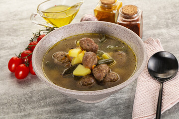 Soup with meatball and potato