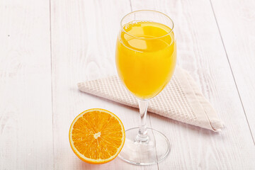 Sweet fresh orange juice in the glass