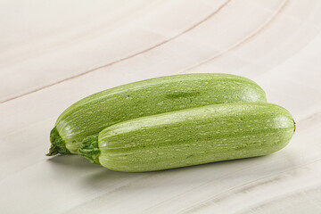 Raw green ripe zucchini vegetable