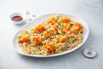 Roasted pumpkin with quinoa and hazelnut