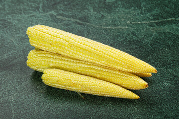 Raw sweet baby corn heap