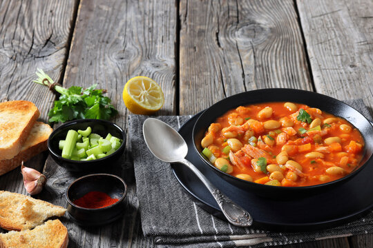 Pasulj, white bean soup with chicken in bowl