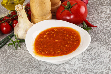 Hot tomato soup with diced chicken