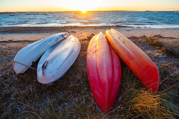 Formentera, playa de la Savina al atardecer con barcas