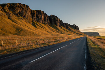Golden Hour Road Along Icelandic Cliffs