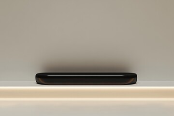Minimalist black platform on a neutral background, ideal for product display or presentation.