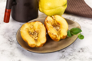 Baked quince with honey and cedar