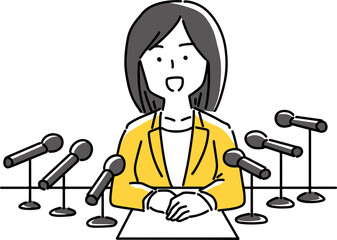 Fototapeta premium 沢山のマイクで囲まれて説明する女性