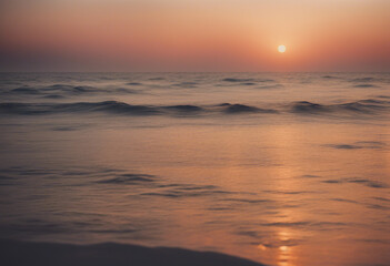 Obraz premium In the tranquil embrace of the sea the horizon becomes a canvas ablaze with the hues of sunset