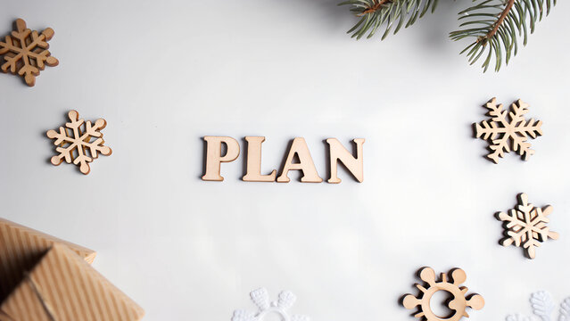 christmas card with space background paln word on wooden board 