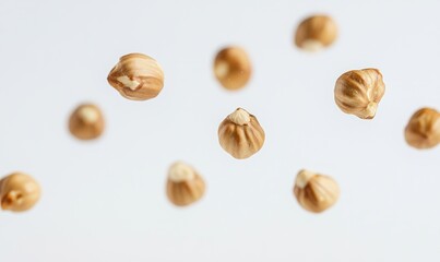 A bunch of nuts are flying through the air