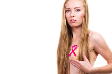 Woman chest in bra, pink cancer ribbon