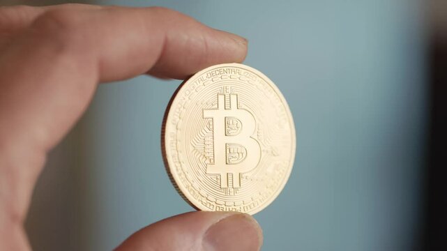 Bitcoin symbol identifies digital, borderless, and innovative currency. Close up shot.