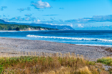 A view over the pebble beach at Little River Harbour on the Cabot Trail, Nova Scotia, Canada in the fall