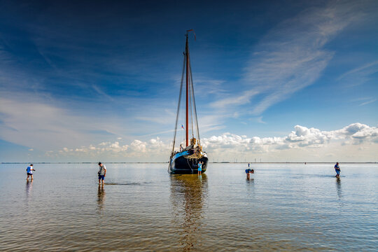 Tjalk - a historic sailing ship - at low tide
