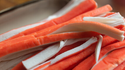 Close-up of crab sticks cut into strips © mikus