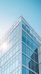 Obraz premium A sleek glass facade reflects the urban sky, showcasing the architectural prowess of this modern high-rise tower