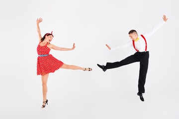 Photo of attractive couple dancers choreographers dancing studio ballroom isolated on white color...