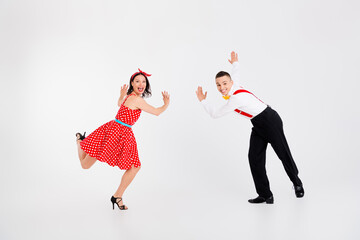 Full size photo of two elegant overjoyed young people dancing isolated on white color background