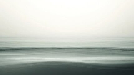 Obraz premium A serene, abstract seascape with soft gradients of gray and white, evoking calmness.