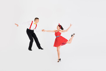 Photo of attractive couple professional dancers choreographers dancing jazz rock isolated on white color background