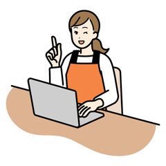 パソコンを使いながらポイントを伝える主婦。