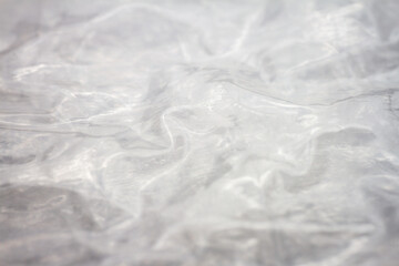 Fototapeta premium Extreme macro of plastic bubble wrap texture. Selective soft focus, shallow depth of field. Abstract dreamy background