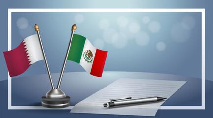 Qatar and Mexico National flags on small table with bokeh background, cooperative relationship
