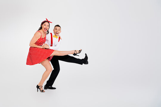 Photo of lovely attractive couple professional dancers active cha cha step dance event isolated on white color background