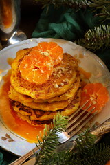 Pumpkin pancakes with tangerines