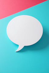 A social media concept features a speech bubble on a blue desk with a colored background for online marketing ideas._00001_