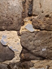 minimalistic background / wall paper design - close up texture of a stone wall - photography