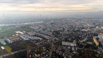 Austria, Vienna: Top Aerial View of Quiet Residential Areas in Districts 21 and 22. A peaceful perspective showcasing the serene neighborhoods of the Austrian capital