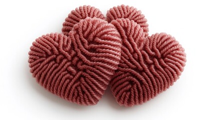 Three textured yarn hearts clustered together on white.